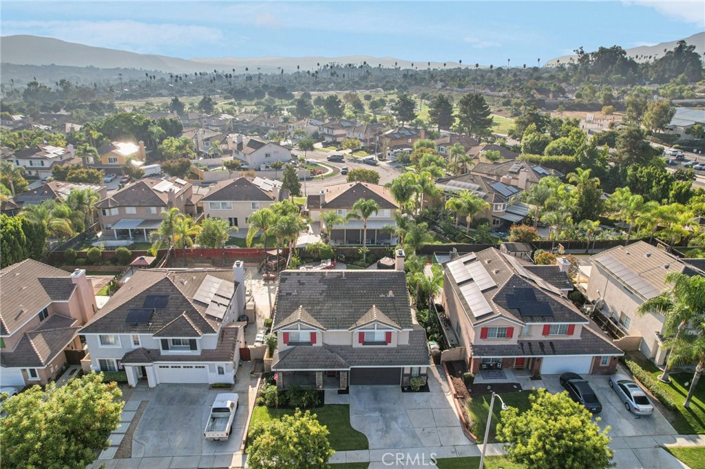 2575 Gilbert Avenue Corona, CA 92881 - Photo 50 of 58 an aerial view of residential houses with outdoor space