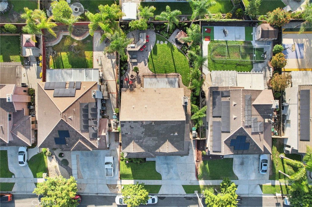 2575 Gilbert Avenue Corona, CA 92881 - Photo 52 of 58 an aerial view of multiple houses with a yard