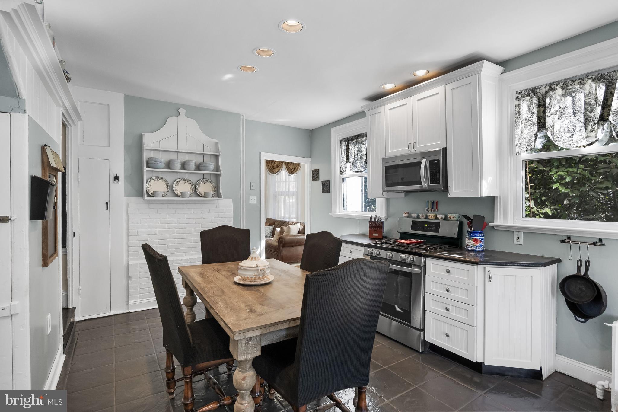 100 Main Street Riverton, NJ 08077 - Photo 20 of 44 a kitchen that has a table and chairs in it