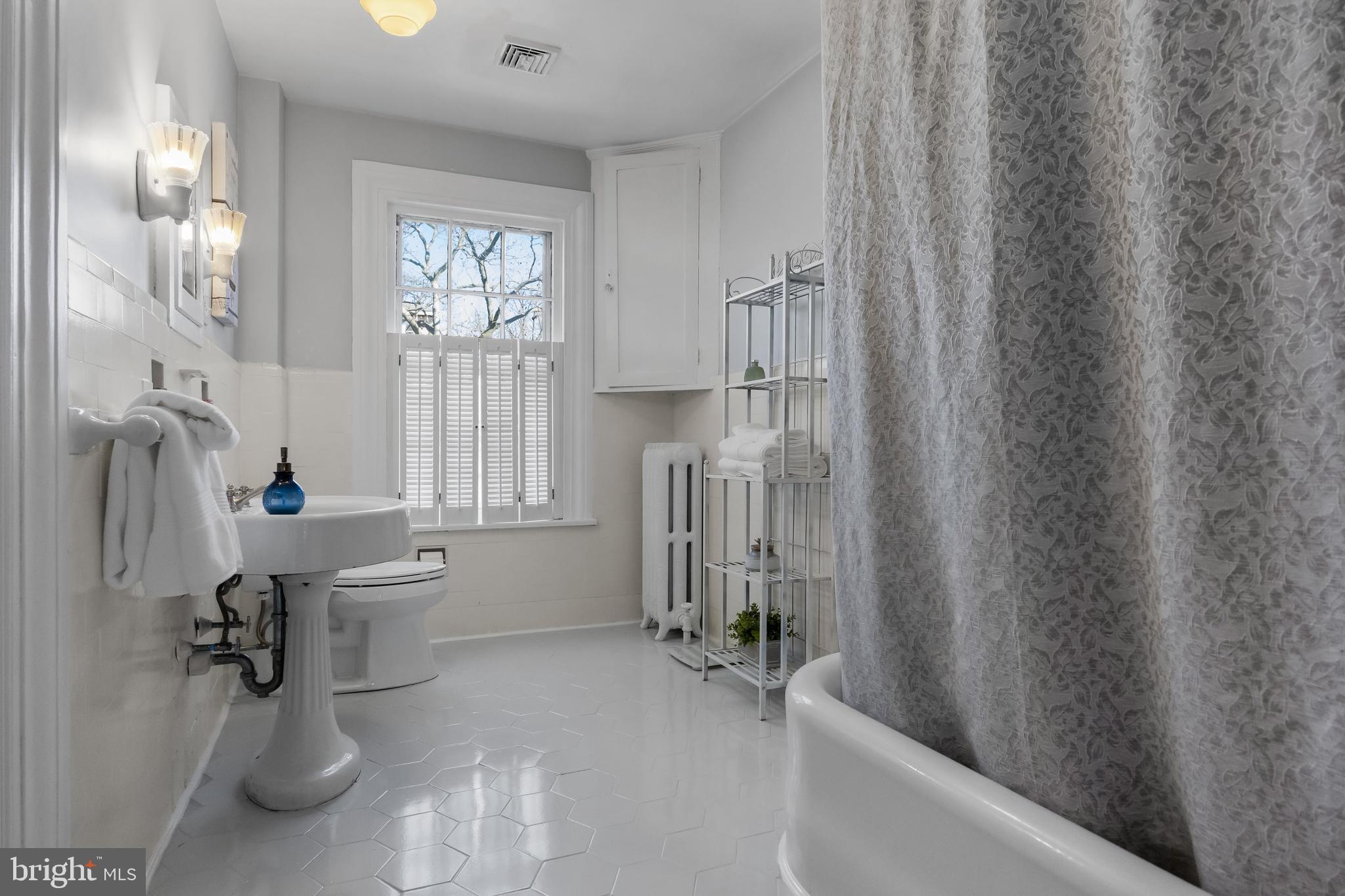 100 Main Street Riverton, NJ 08077 - Photo 32 of 44 a bathroom with a sink toilet and shower