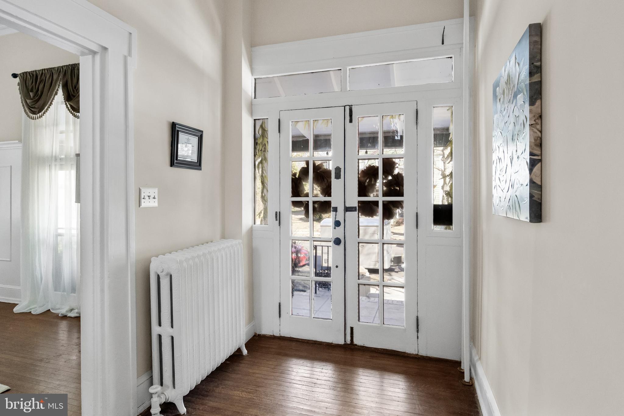 100 Main Street Riverton, NJ 08077 - Photo 9 of 44 a view of a hallway with wooden floor and closet