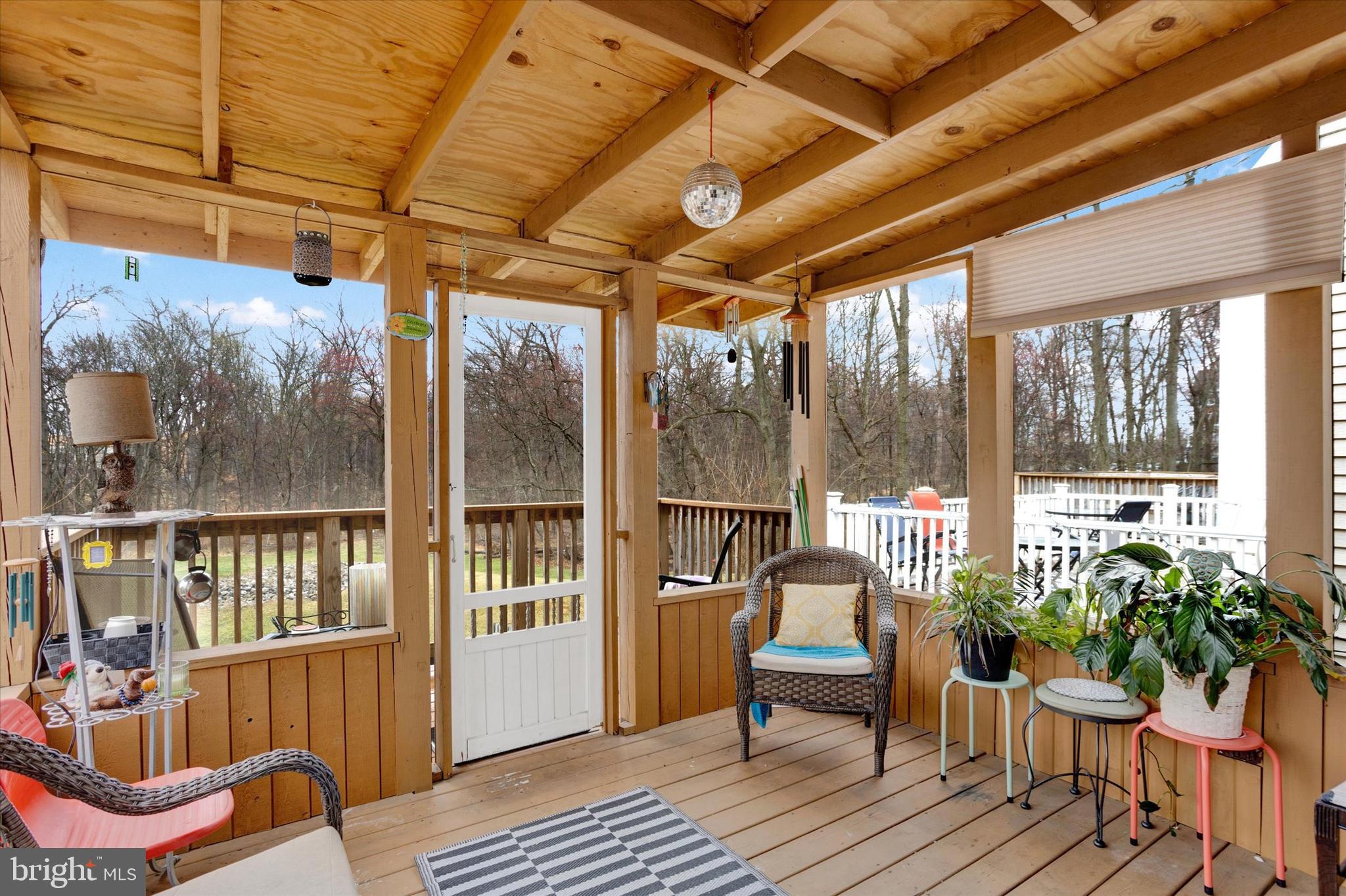7278 Procopio Circle Columbia, MD 21046 - Photo 12 of 30 a balcony with furniture and wooden floor
