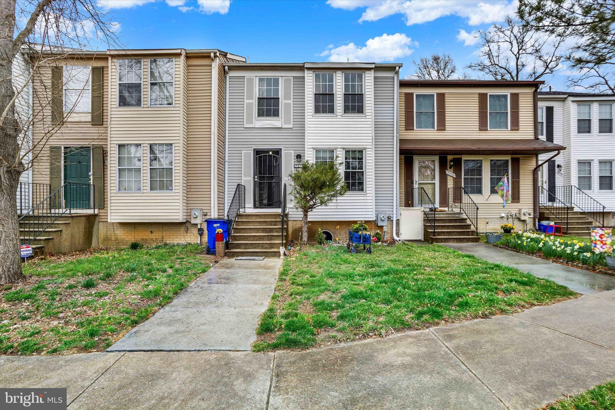 7278 Procopio Circle Columbia, MD 21046 - Photo 2 of 30 a front view of a house with garden