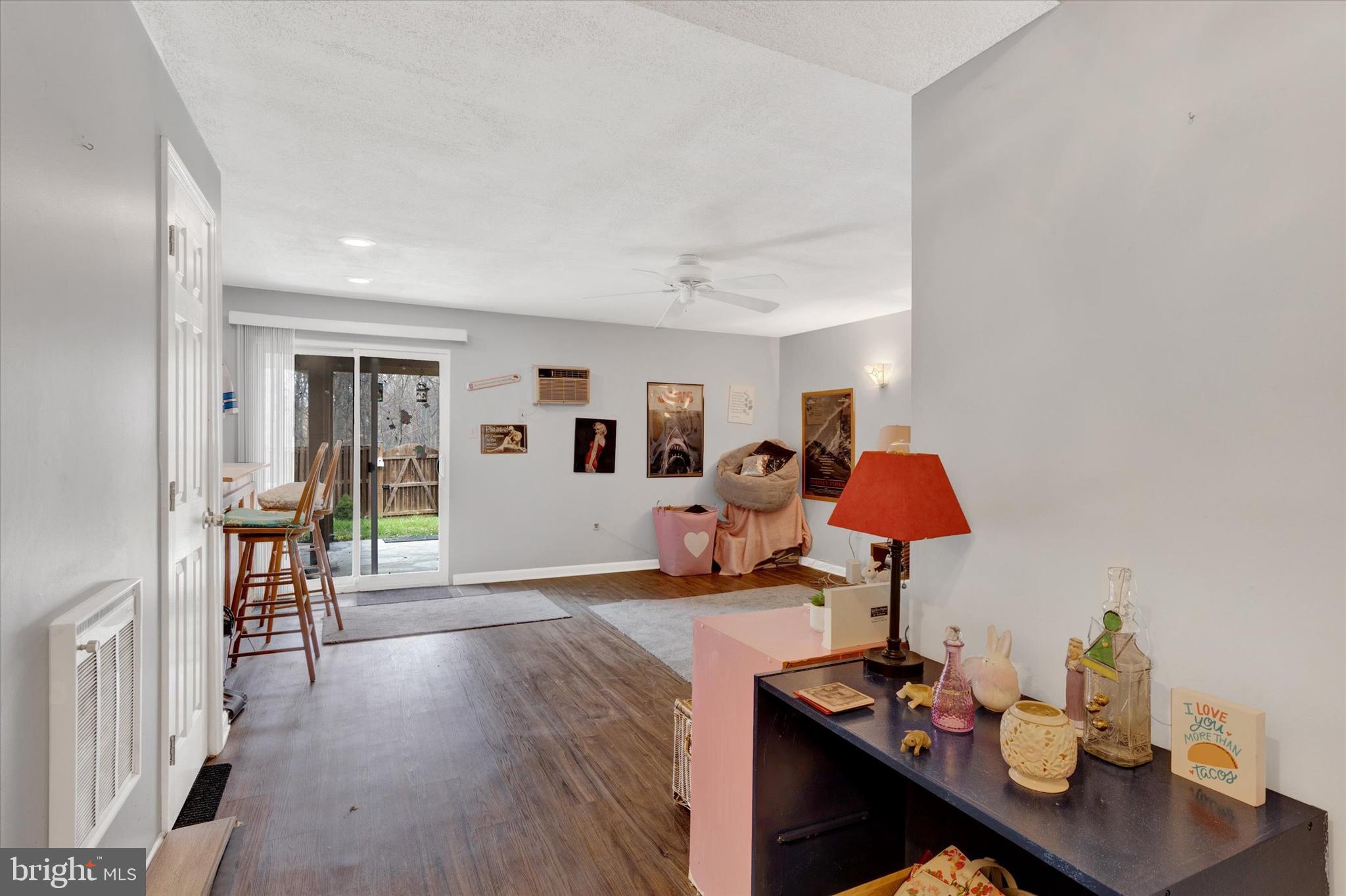 7278 Procopio Circle Columbia, MD 21046 - Photo 21 of 30 a living room with furniture and a table