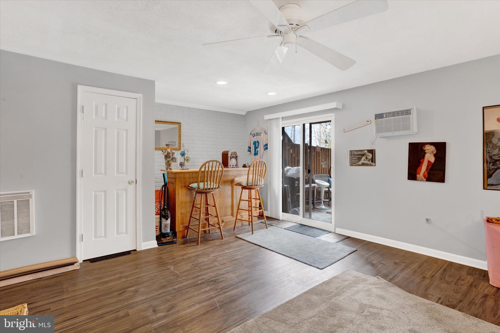 7278 Procopio Circle Columbia, MD 21046 - Photo 22 of 30 a living room with furniture and a wooden floor