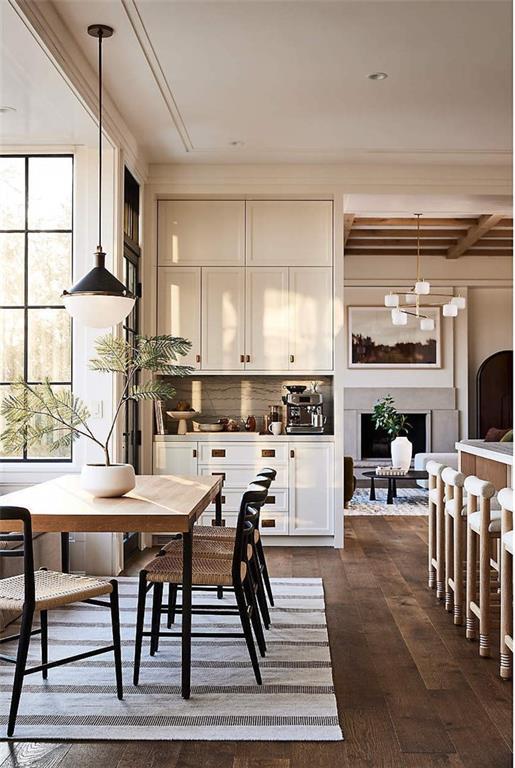 327 Crest Pointe South Bremen, GA 30110 - Photo 7 of 13 a kitchen with stainless steel appliances kitchen island granite countertop a table chairs and a refrigerator