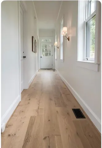 a kitchen with a stove and cabinets