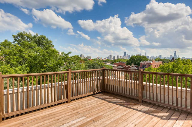 931 West Wolfram Street, Unit 2 Chicago, IL 60657 - Photo 13 of 13 a view of balcony with wooden floor