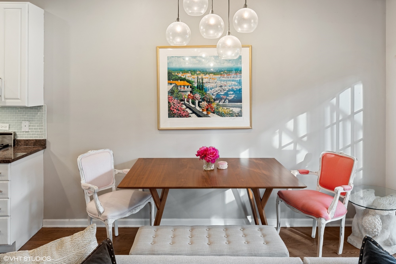 931 West Wolfram Street, Unit 2 Chicago, IL 60657 - Photo 4 of 13 a view of a dining room with furniture and wooden floor