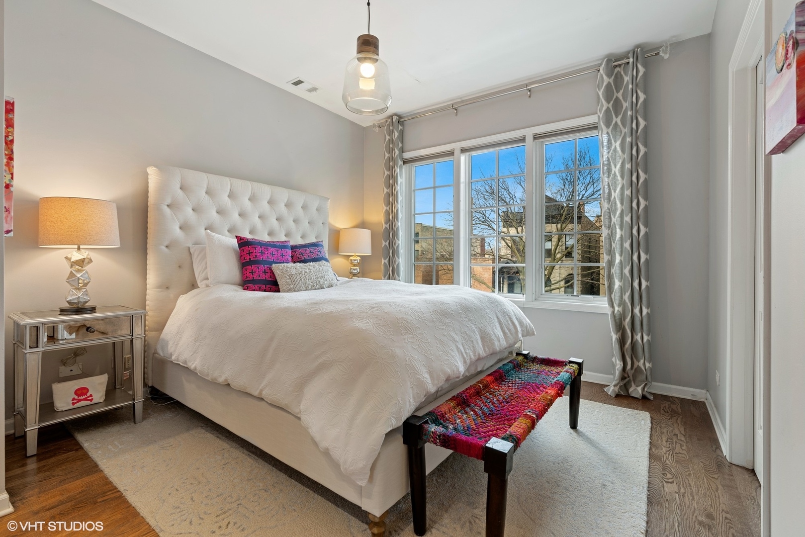 931 West Wolfram Street, Unit 2 Chicago, IL 60657 - Photo 8 of 13 a bedroom with a bed and a window