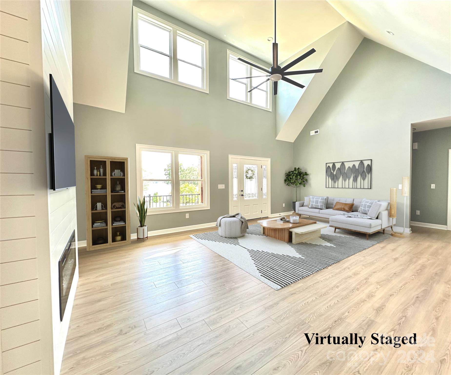 169 Harbor Point Drive Cherryville, NC 28021 - Photo 11 of 37 a living room with furniture and a fireplace