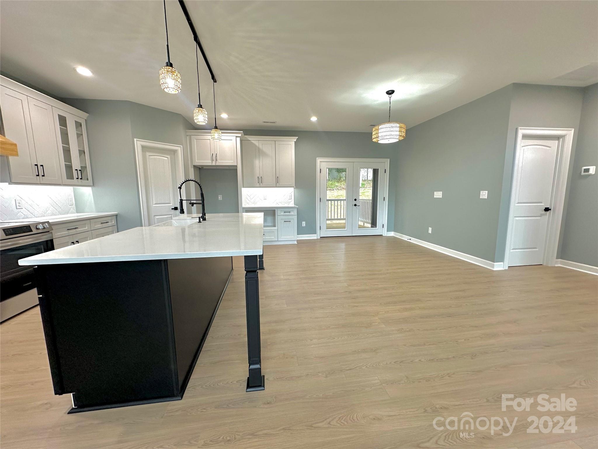 169 Harbor Point Drive Cherryville, NC 28021 - Photo 15 of 37 a large bathroom with a sink a large mirror and vanity
