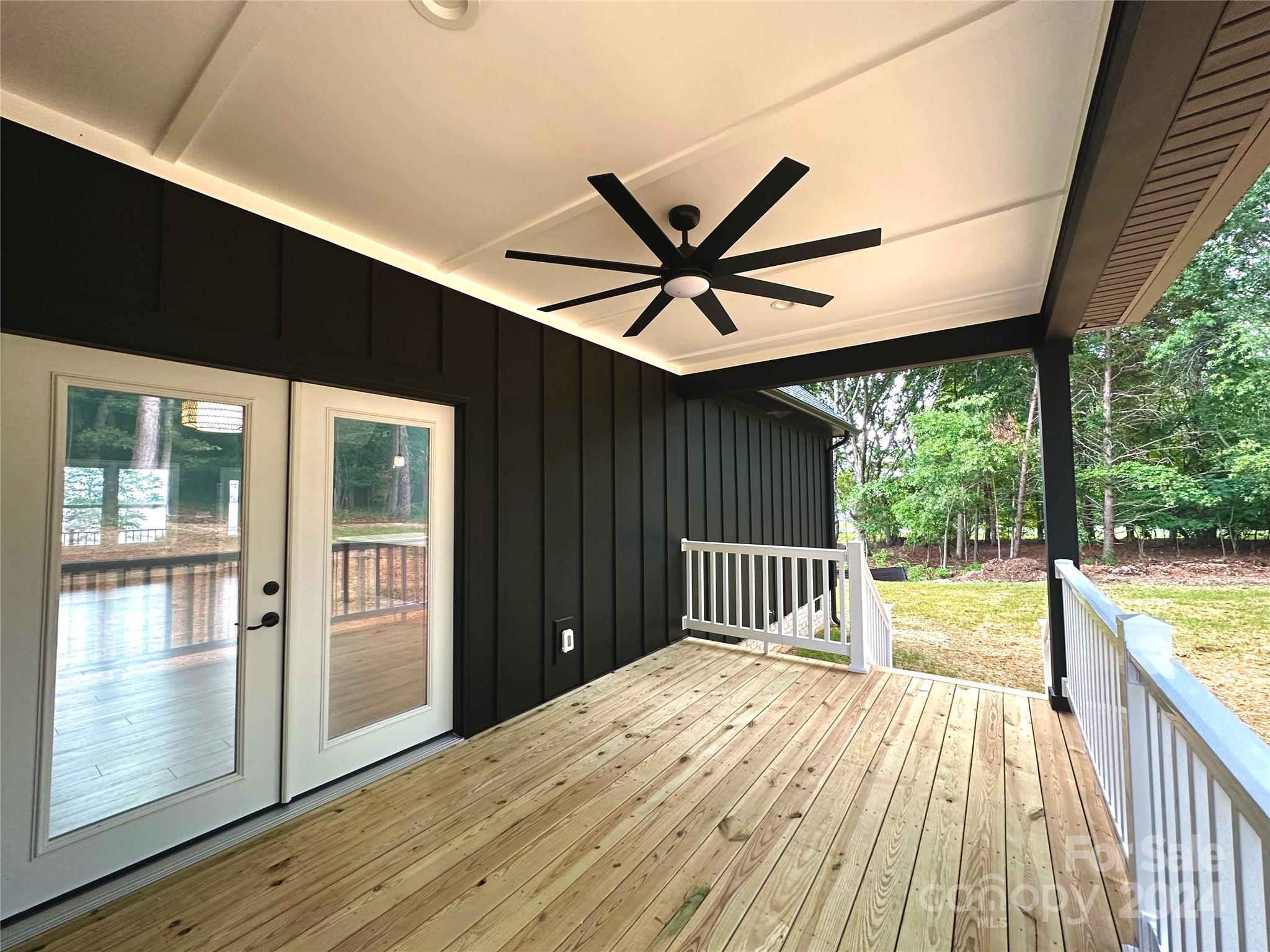 169 Harbor Point Drive Cherryville, NC 28021 - Photo 36 of 37 a view of a porch with wooden floor and outdoor space