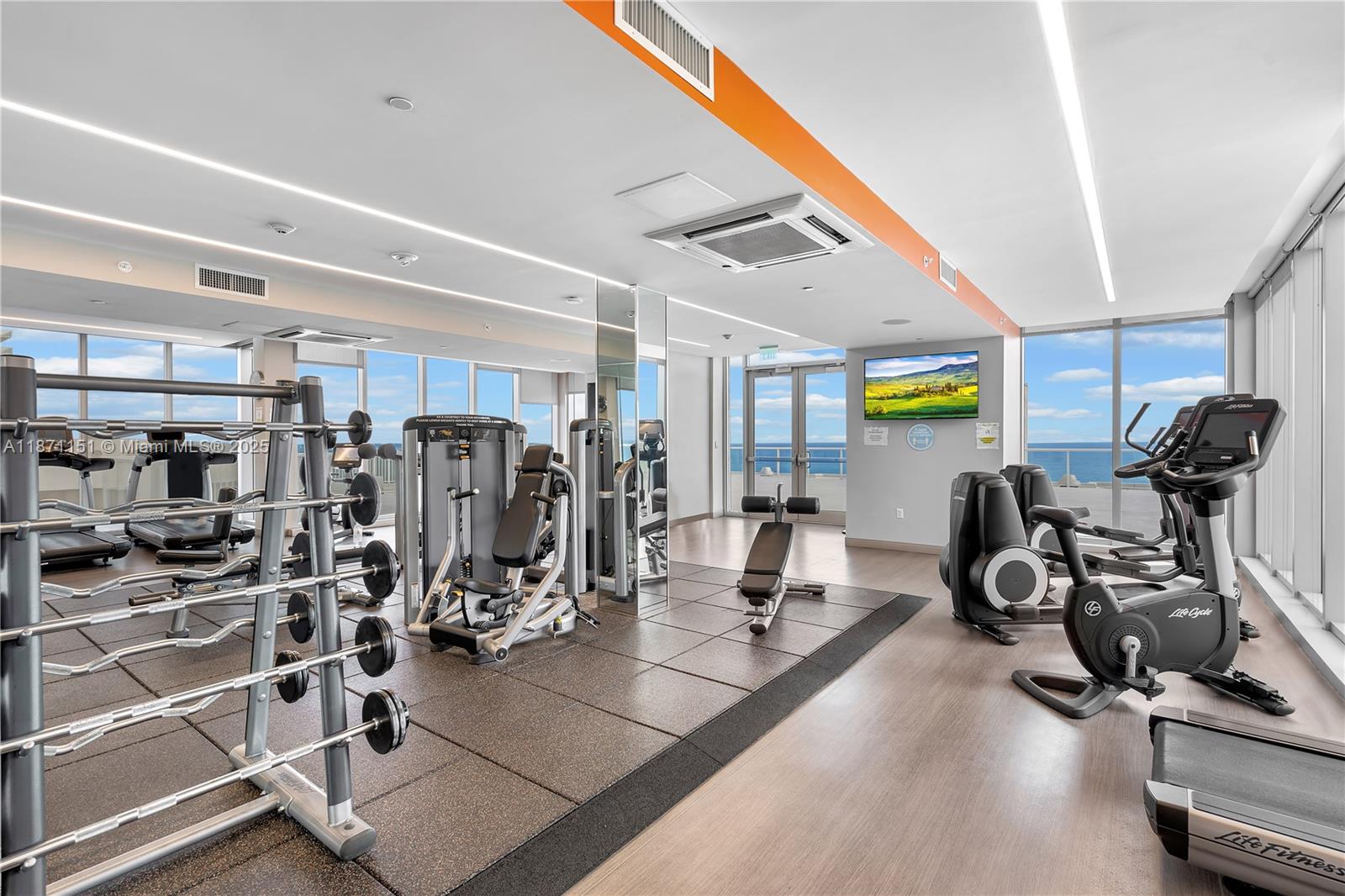 10155 Collins Avenue, Unit 606 Bal Harbour, FL 33154 - Photo 34 of 48 a view of a room with gym equipment