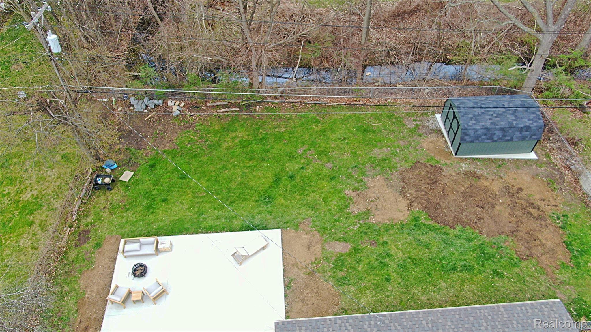 1215 Delta Road Walled Lake, MI 48390 - Photo 23 of 25 Overview of the large yard