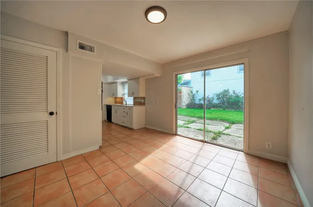 a view of a room & utility room