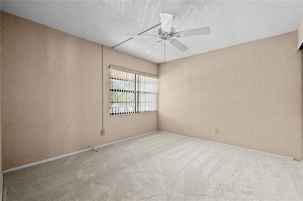 12300 Vonn Road, Unit 1205 Largo, FL 33774 - Photo 22 of 32 a view of an empty room with a window