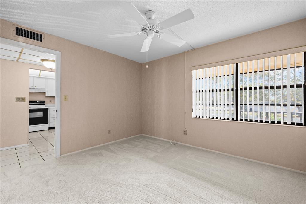 12300 Vonn Road, Unit 1205 Largo, FL 33774 - Photo 25 of 32 a view of an empty room with a window