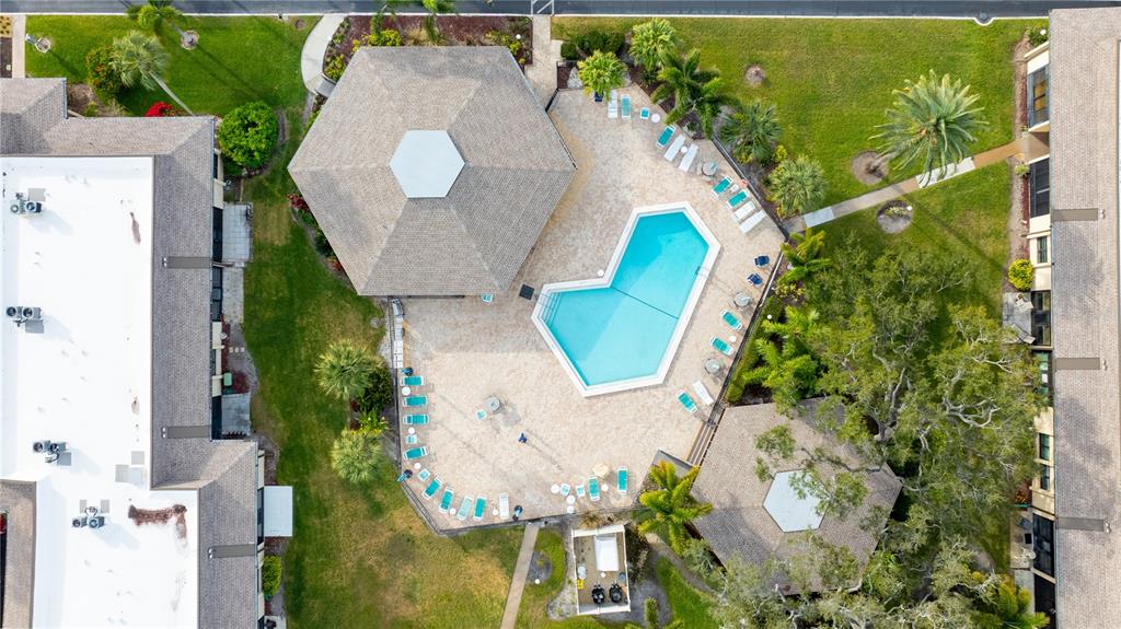 12300 Vonn Road, Unit 1205 Largo, FL 33774 - Photo 27 of 32 an aerial view of a house with a swimming pool and garden