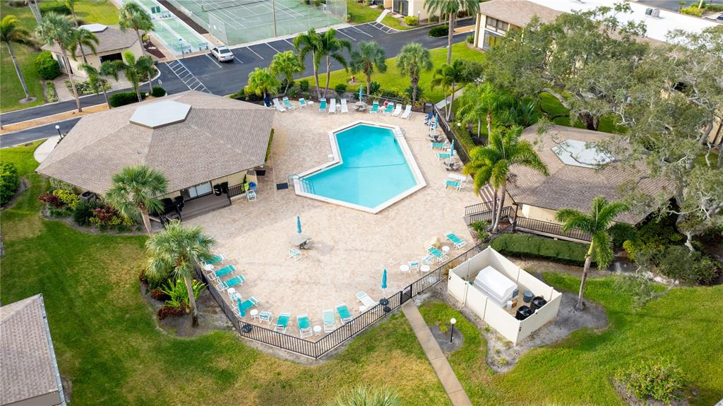 12300 Vonn Road, Unit 1205 Largo, FL 33774 - Photo 28 of 32 an aerial view of a house with outdoor space pool seating area and yard