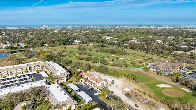 a view of a balcony with wooden floor