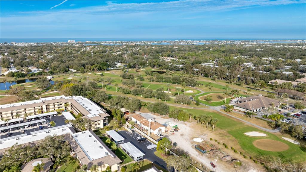12300 Vonn Road, Unit 1205 Largo, FL 33774 - Photo 31 of 32 an aerial view of residential houses with outdoor space