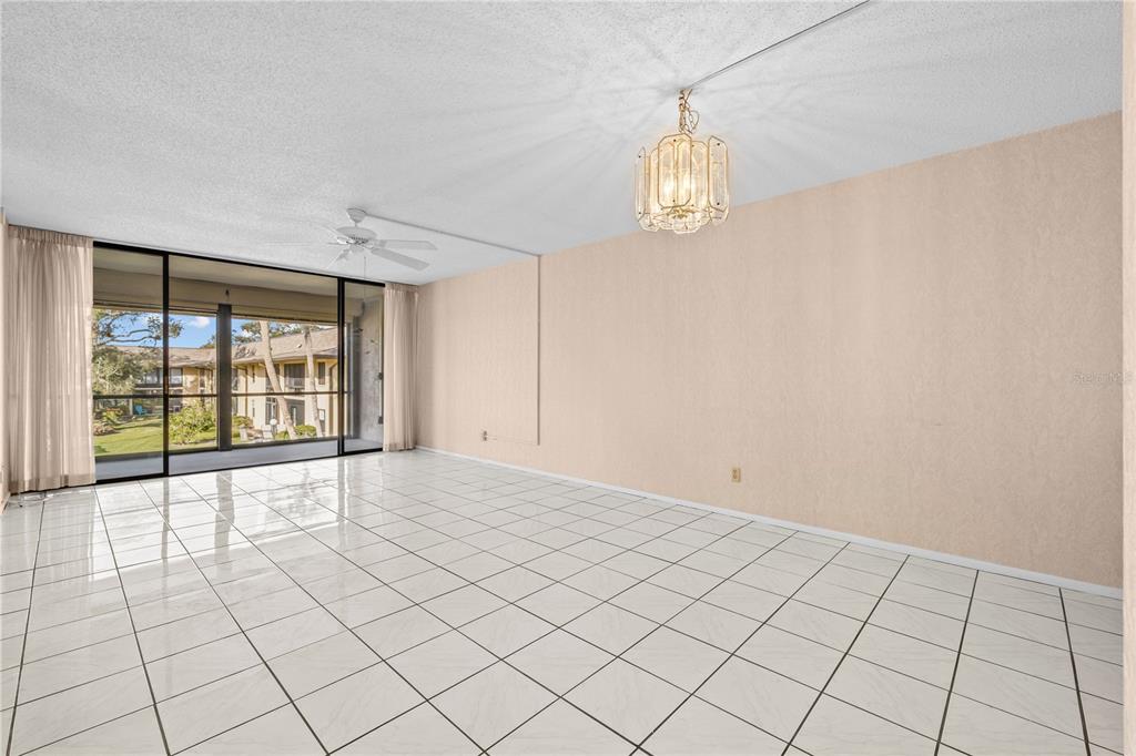 12300 Vonn Road, Unit 1205 Largo, FL 33774 - Photo 7 of 32 a view of an empty room with a window