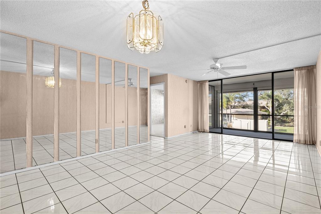 12300 Vonn Road, Unit 1205 Largo, FL 33774 - Photo 8 of 32 a view of an empty room and window