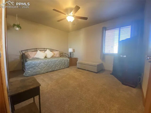 a room with furniture and air conditioner vent