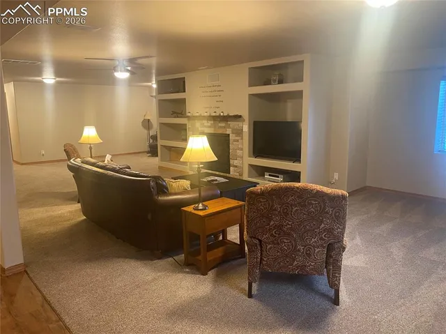 a kitchen with stainless steel appliances granite countertop a sink and a microwave