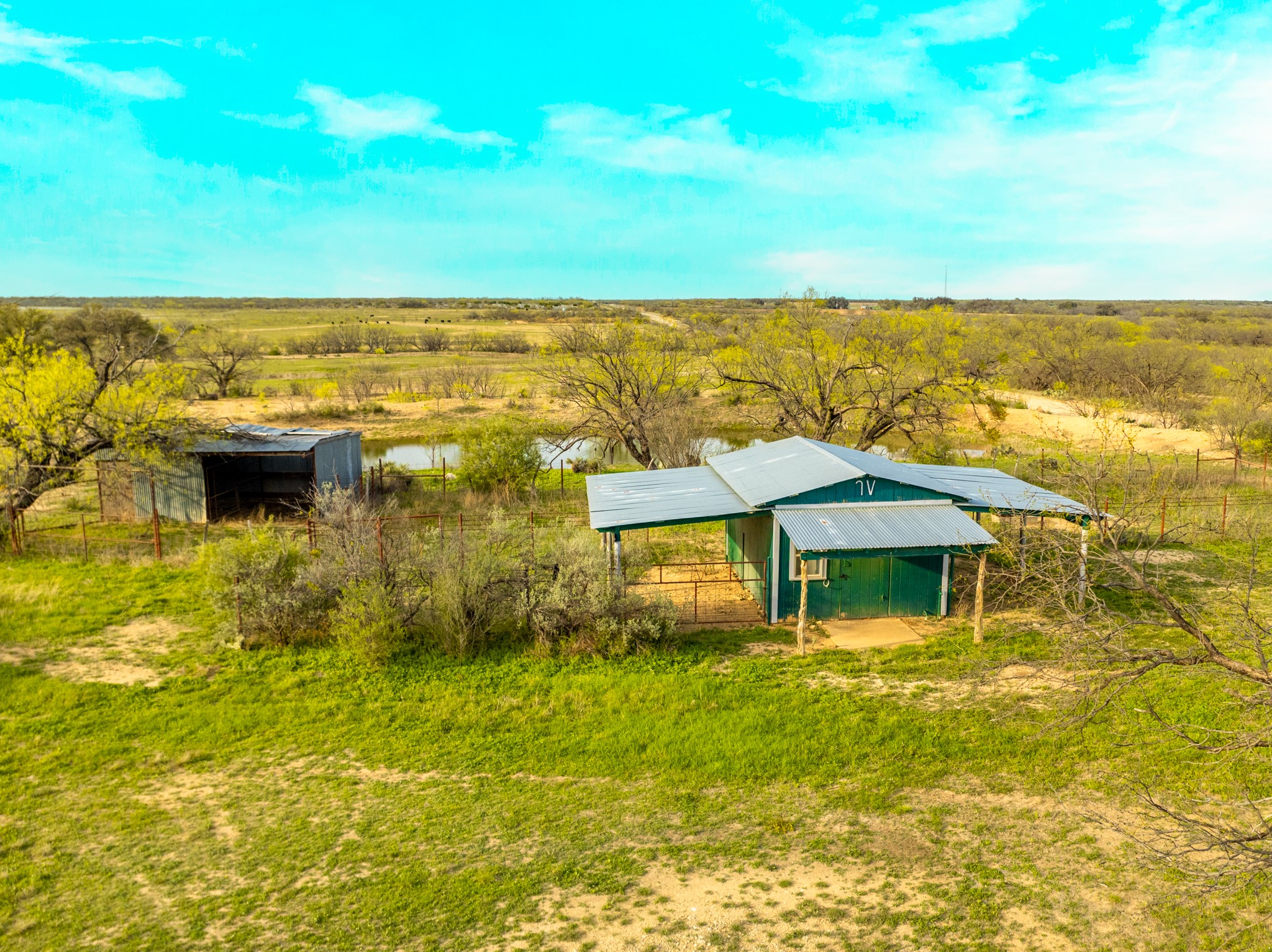 2145 County Road 320 Lohn, TX 76852 - Photo 15 of 39 View of pole building featuring a view of countryside