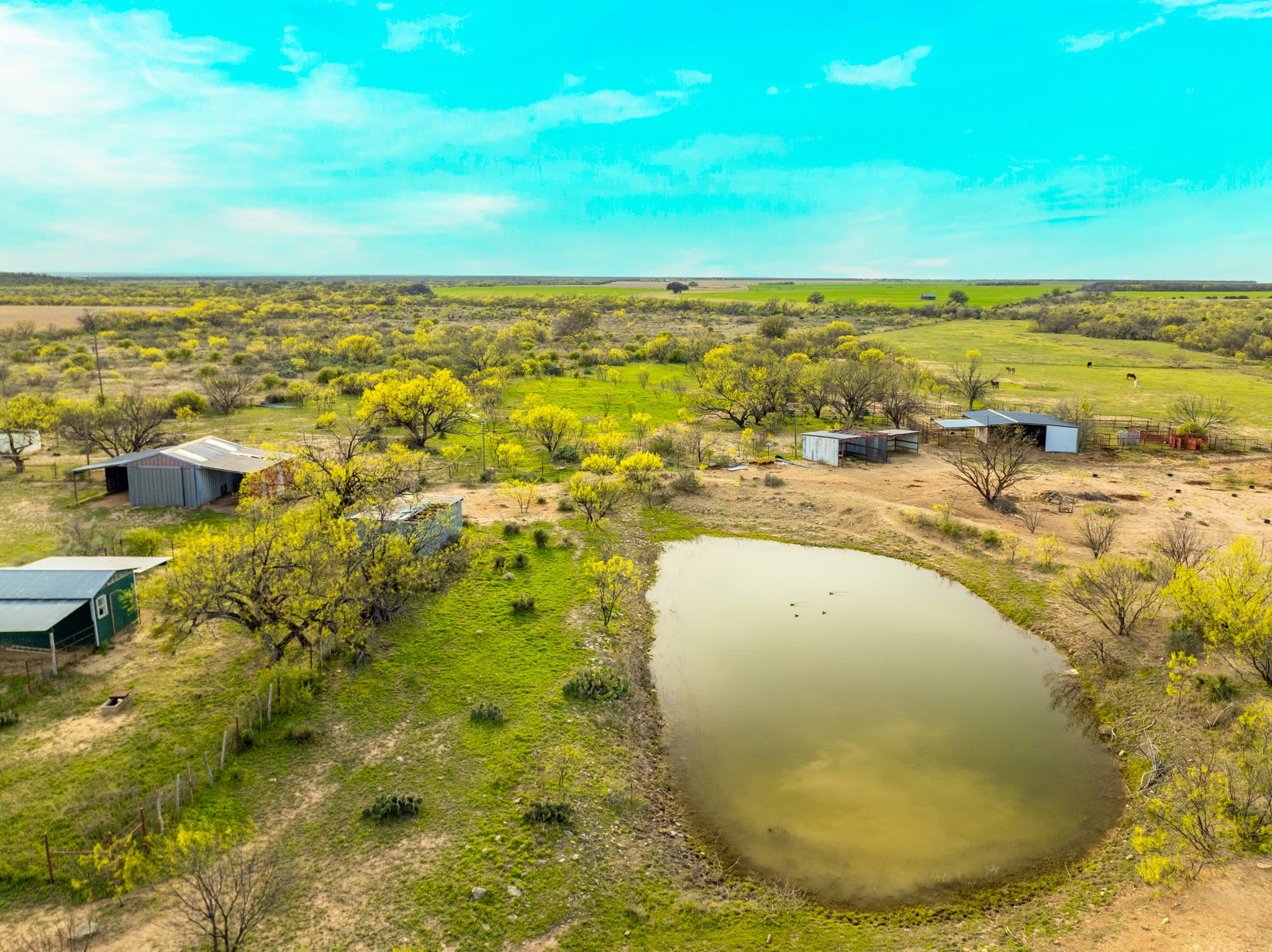 2145 County Road 320 Lohn, TX 76852 - Photo 17 of 39 Aerial view of sparsely populated area with a large body of water