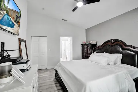 a bath room with a bath tub and a shower