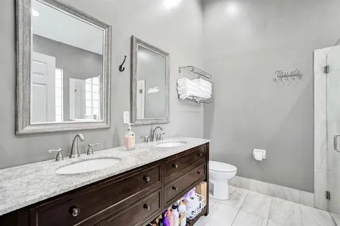 a bathroom with a shower and a tub
