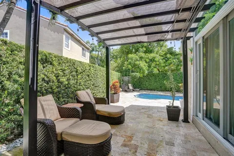 a kitchen with a sink stove and refrigerator