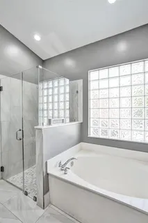 a bathroom with a sink vanity and mirror