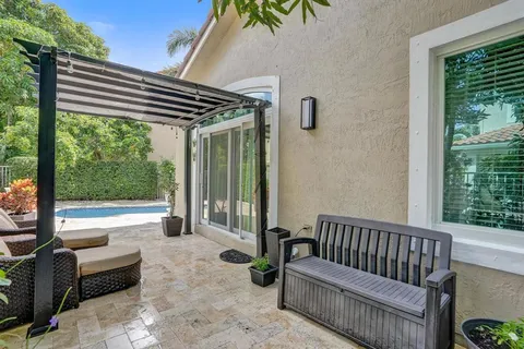 front view of a house with a garden