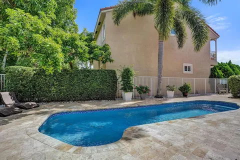 a view of a lake with a yard