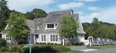 304 Parker Road Osterville, MA 02655 - Photo 1 of 15 a front view of a house with garden