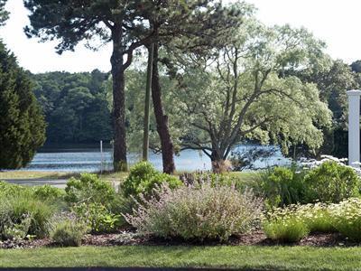 304 Parker Road Osterville, MA 02655 - Photo 5 of 15 a view of garden with trees