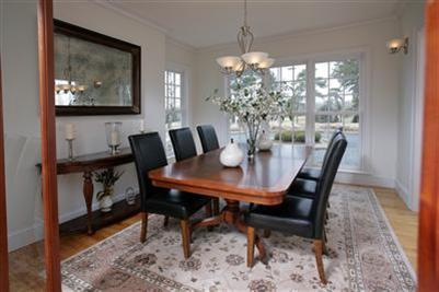 304 Parker Road Osterville, MA 02655 - Photo 9 of 15 a view of a dining room with furniture window and outside view