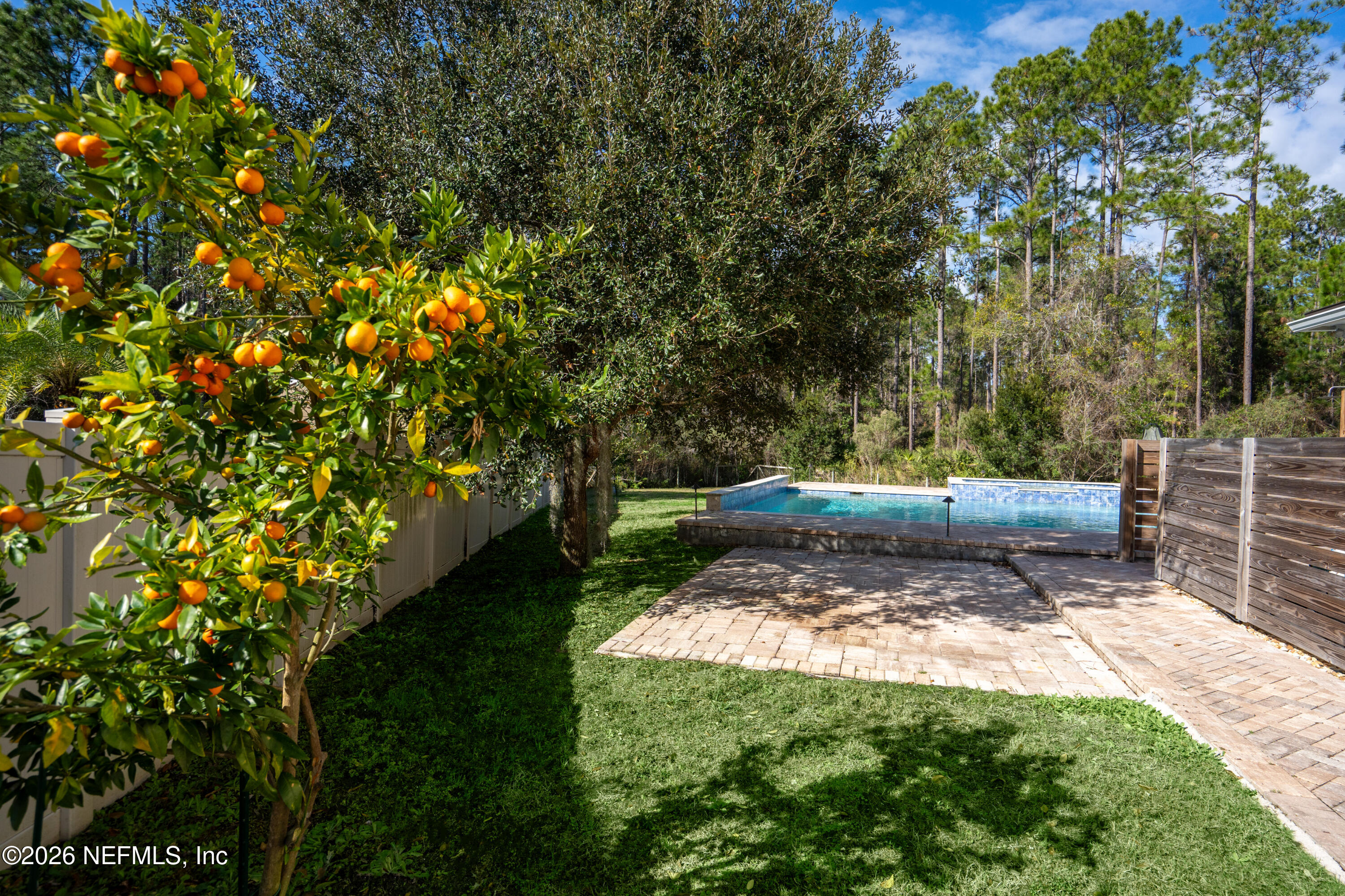 10 Hacienda Way St. Augustine, FL 32095 - Photo 57 of 75 Side Yard Paver Parking Pad