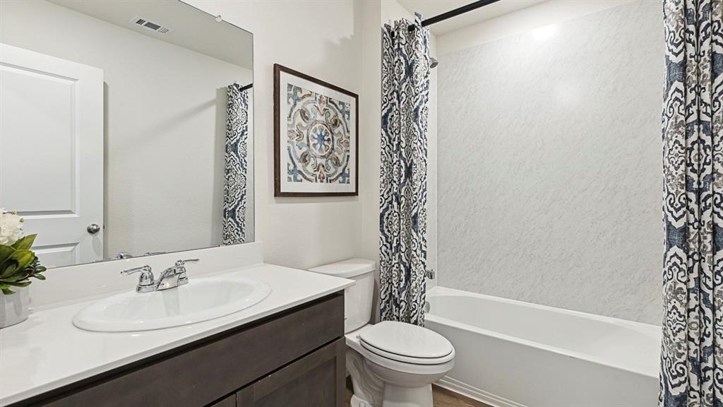 120 Pheasant Run Road Lavon, TX 75166 - Photo 4 of 17 Bathroom with vanity and shower / bath combo