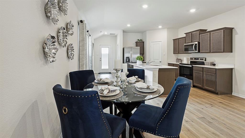 120 Pheasant Run Road Lavon, TX 75166 - Photo 8 of 17 Dining space with light wood-style flooring and recessed lighting