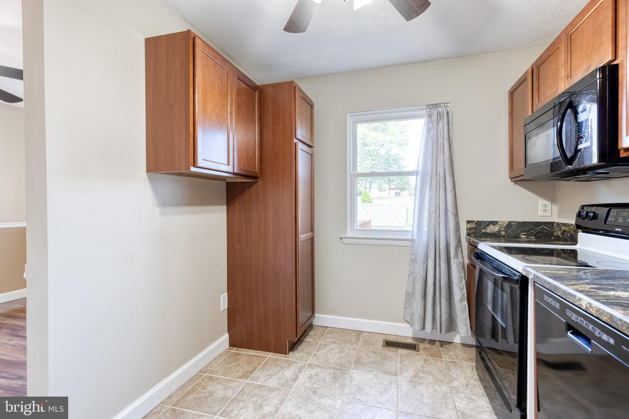 28 Patrick Court Abingdon, MD 21009 - Photo 11 of 22 a kitchen with stainless steel appliances granite countertop a refrigerator and a sink