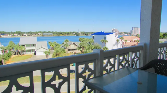 a view of a chairs and table in patio