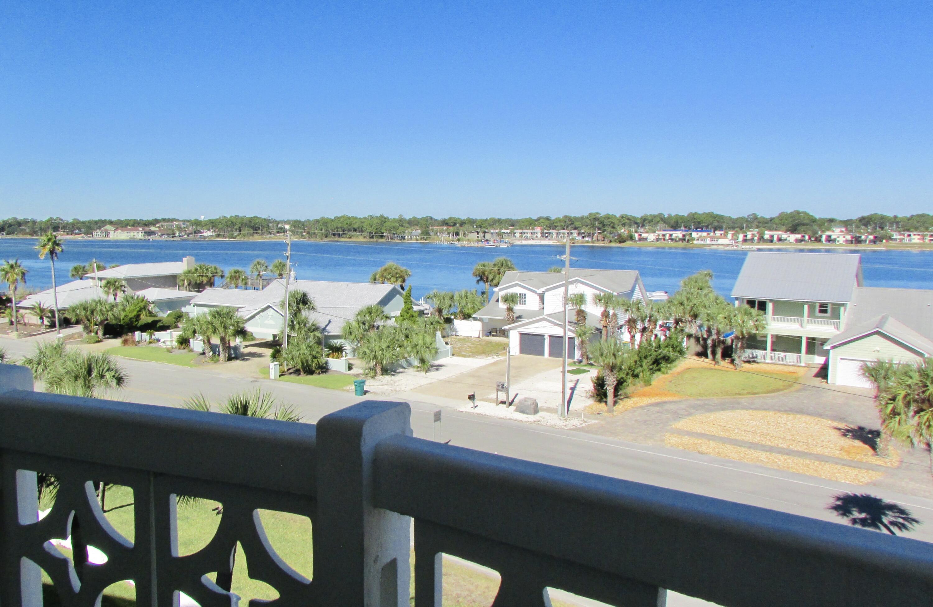909 Santa Rosa Boulevard, Unit 555 Fort Walton Beach, FL 32548 - Photo 12 of 12 a view of a balcony with an ocean view