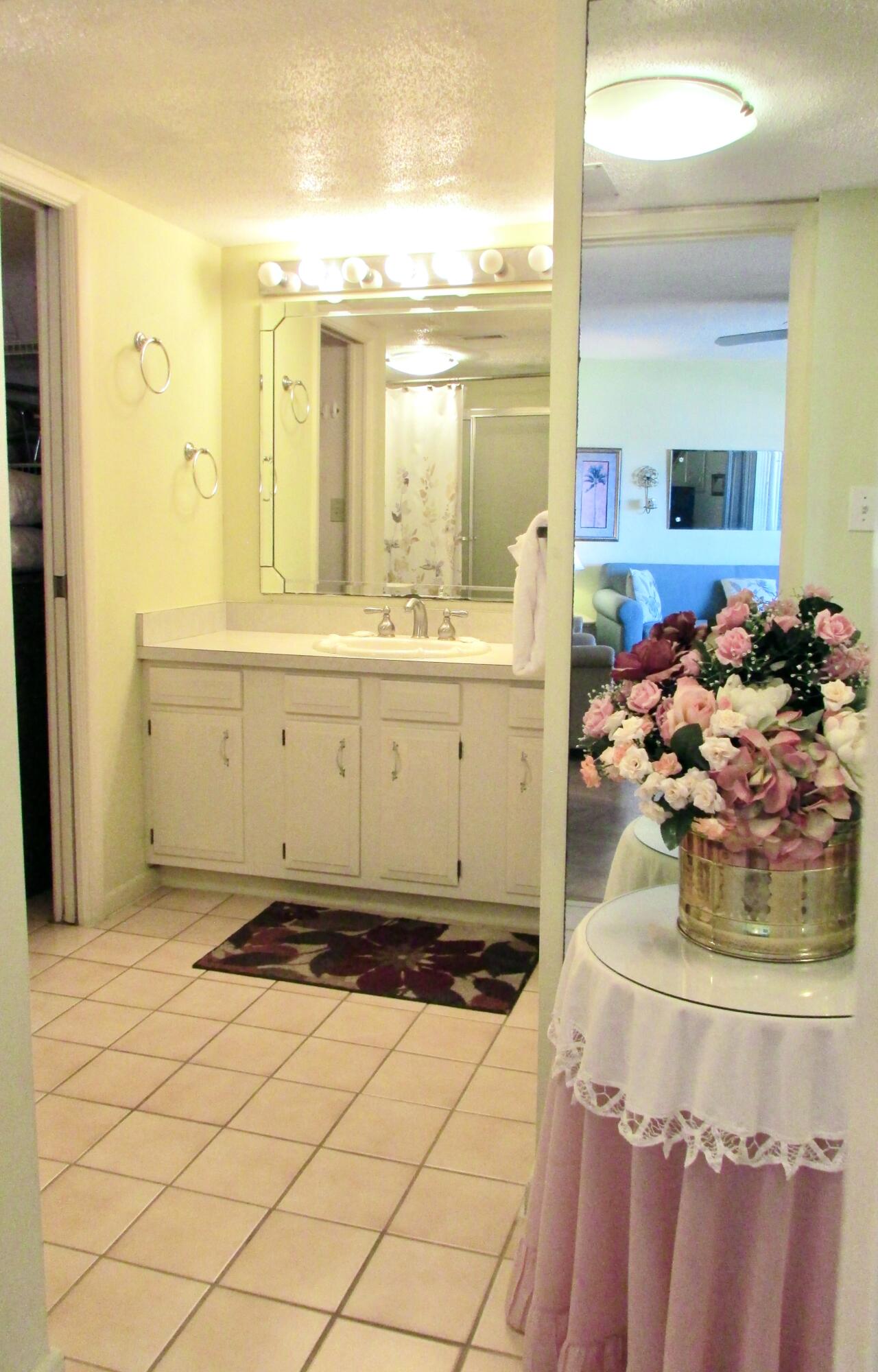 909 Santa Rosa Boulevard, Unit 555 Fort Walton Beach, FL 32548 - Photo 10 of 12 a view of a kitchen with a sink and cabinets