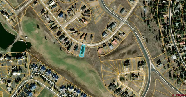 an aerial view of a residential apartment building with entryway