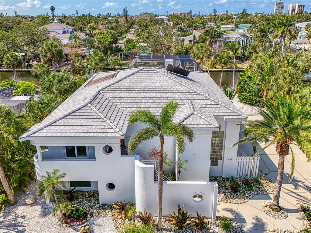 412 Treasure Boat Way Sarasota, FL 34242 - Photo 2 of 91 a aerial view of a house with a yard